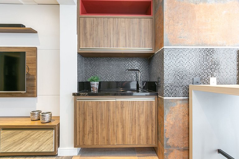 Apartamento com sacada e churrasqueira